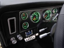 Autometer gauges look hot in the custom made dash insert.