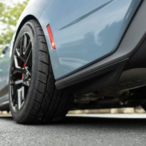 RTR Rear Quarter Splitters for 2024+ Mustang installed - rear view looking forward