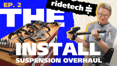 Image of Randy Pobst looking at Ridetech parts that are about to be installed on his 2nd gen Trans Am.